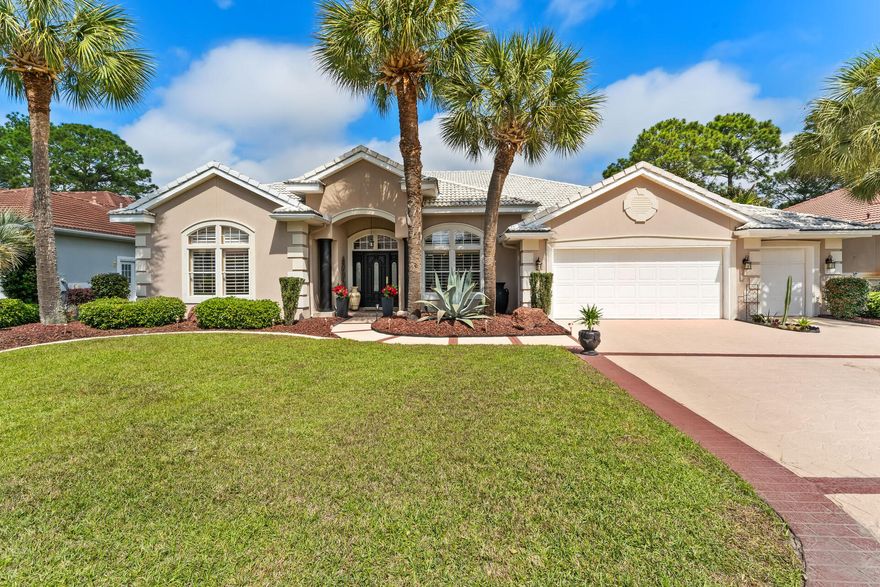 Immaculate Residence Located In The Highly Sought After Gated Community, Emerald Bay! This Gorgeous 3 Bedroom, 2.5 Bath Home With Office Backs Up To The 11th Green & Has Meticulous Landscaping! Features Include: High Ceilings, Tile & Wood Floors Throughout, Extravagant Crown Molding, Open Floor Plan, Dining Room With Custom Built In Shelving, Living Room With Sliders Leading To Lani, Family Room With Gas Fireplace, Fully Applianced Kitchen Has Island With Additional Sink, Deluxe Cabinetry, Granite Countertops, Travertine Backsplash & Breakfast Nook. Owners Suite Features Sitting Area With Large Bay Window, 2 Walk-In Closets, Glamour Bathroom With Double Vanity, Whirlpool Tub & Large Tiled Shower.  Walk Out Back To The Beautiful Heated Inground Pool, Hot Tub & Spacious Enclosed Lanai =