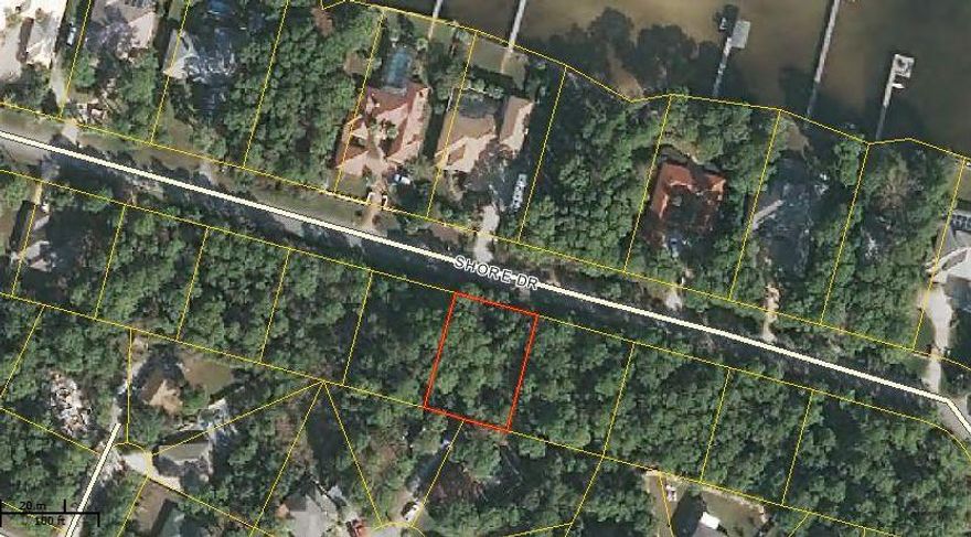 Located in Miramar Beach just across from the bay this heavily wooded lot will afford the homeowner some water views, no HOA fees and convenient to shopping, restaurants, movie theatre.Lot dimensions are 100 x 125 and Environmental Sciences has determined that the buildable footprint of a home is 48x50. Lots 5&7 are also available for an additional price.