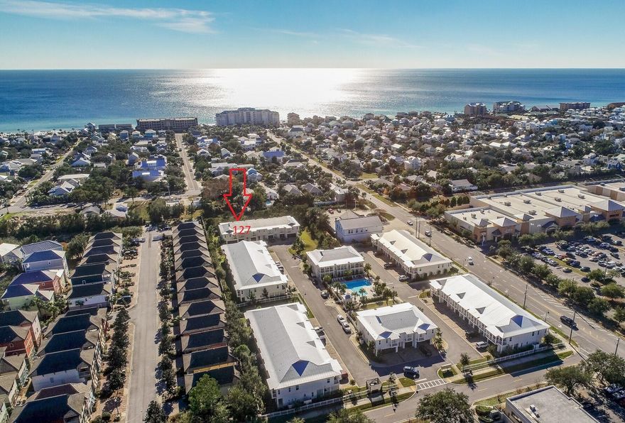 This freshly decorated 3-bedroom Townhome with Garage is within walking distance to the beach and is short term rental capable (with strong rental projections) is being offered furnished. Located within a Resort Style Community in the heart of Crystal Beach with a community pool and pet park.  Centrally Located & close to several local restaurants, coffee shop, book store, ice cream shops and shopping. The open floor plan is designed for family gatherings or entertaining. The private balcony off of the living area offers a serene view. First floor features two bedrooms, a full bathroom and walk in laundry room. The second floor opens to a living, dining, kitchen area with a private balcony along with the master bedroom and an additional half bath.