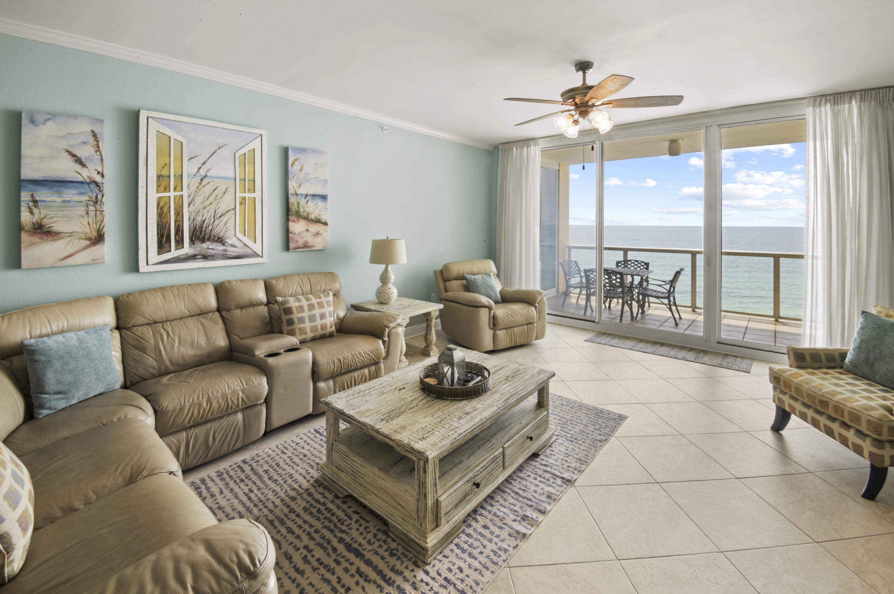 2024 GROSS $85K! Beautiful, waterfront condo on Navarre Beach offering breathtaking sunset views over the Gulf of Mexico! This condo was recently COMPLETELY UPDATED and comes FULLY FURNISHED - ready for a new owner! Comfortably SLEEPING 10, this gulf front condo is the LARGEST you can get in Navarre Beach for under a million, with an equally massive balcony! The beach themed decor, coupled with a clean blue/white color scheme, has a calming effect that welcomes visitors to coastal living. The kitchen features granite countertops, white shaker cabinetry (soft close), stainless-steel appliances, and a breakfast bar. The main living area provides ample room for both dining and relaxing, with 9-ft ceilings further amplifying the space. The gulf front master bedroom is massive with a king bed, floor to ceiling windows, and private balcony access. The en-suite bathroom was recently updated with a massive, tile walk-in shower and double granite vanity. Both guest bedrooms feature double queen beds and share an updated bathroom in the hallway. Not only can you enjoy private gulf front views from the balcony, but when entering and exiting the condo you can enjoy expansive views of the Santa Rosa Sound. Caribbean Resort comes complete with two elevators, a large swimming pool, 2 hot tubs, owner storage units, a private beach boardwalk, and a private dog area. This gulf front condo is a RENTAL MACHINE sleeping 10 guests, so stop on by and add it to your portfolio today!