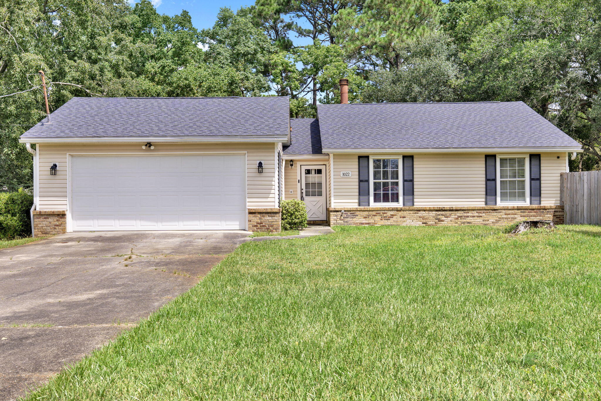 Welcome to this beautifully updated 3 bedroom, 2 bathroom, 1,336 sqft home situated on a spacious corner lot in Mary Esther, FL. Featuring a semi-open concept layout, this home blends comfort and modern updates throughout.Step inside to find new LVP flooring and fresh paint carried throughout the entire home. The living room boasts a charming brick fireplace, perfect for cozy evenings. The kitchen is complete with a stainless steel refrigerator and dishwasher, newly resurfaced cabinets with updated hardware, granite countertops, and new French doors that open to your backyard retreat.Both bathrooms are upgraded with granite countertops, and the master suite includes a walk-in closet for added convenience. Every detail has been touched, with all lights and ceiling fans ... updated, including ceiling fans in each bedroom.
Additional peace of mind comes with the roof replaced in 2022 and HVAC system updated in 2021.
This move-in ready home offers modern updates, timeless charm, and a prime location. Don't miss the chance to make it yours!