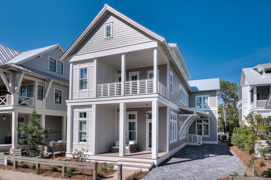 Enjoy the special WaterColor lifestyle to the fullest in this gorgeous, brand new home built by trusted local builder Romair Homes. Nestled on a quiet street in Phase III with minimal traffic, this three story home is convenient to amenities yet sheltered from the crowds. A spacious open concept living and dining area and four large bedrooms plus a bunk room offer ample room for hosting family and friends. Special features include wire brushed distressed oak floors, V groove walls, 12' first floor ceilings, Carrara marble countertops and Sub Zero and Wolf appliances. The third floor serves as a bonus living area complete with media room, loft, wet bar, bunk room, bathroom and storage room. Take advantage of the mild Northwest Florida climate with thoughtfully designed outdoor spaces including covered and open porches and an amazing backyard with large private swimming pool (14.8x11) with spa, Baja deck and cabana with 42' Isokern outdoor fireplace. Located on 499 acres in the renowned South Walton Beaches, WaterColor was created with families in mind and offers the charm of small town life. Exceptional community amenities include several beautiful swimming pools, a gulf front beach club, nature trails, kayaking, canoeing, a fitness center, tennis, Camp WaterColor for kids, parks and green spaces. Home should be completed in August.