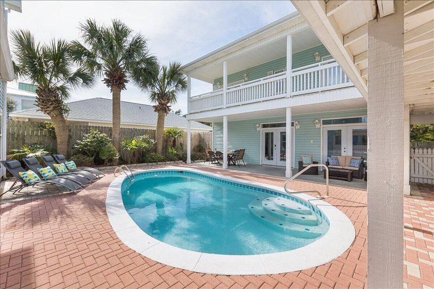 Amazing vacation rental opportunity!!! This incredible beach compound is located less than 500 feet from the beautiful white sands and crystal clear waters of the Gulf of Mexico and the newly constructed beach access! The home is designed for absolute relaxation and pure enjoyment of the beach. This is truly a special find in this area as it's so close to the water, yet with so much privacy. No neighbors on three sides, a short walk to the beach and not to mention your own glorious private heated pool. Another coveted benefit of this property, is the detached carriage house. This is a perfect additional living area, if you're having a larger family gathering but still want to have your own space. Vacationers absolutely love this and book this property out for this very reason.