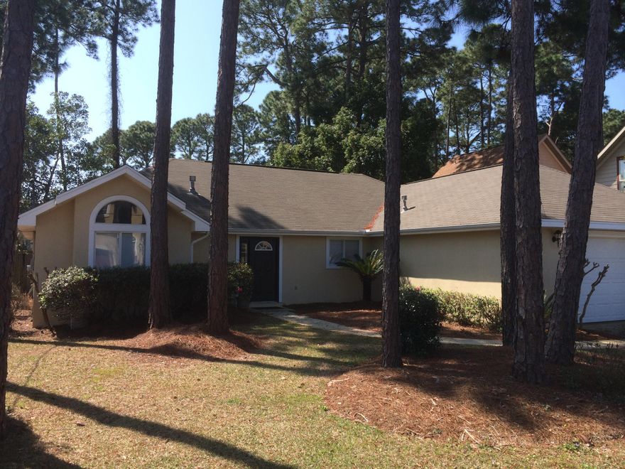 Great location across the street from the Bay. Convenient to all Destin has to offer.Bay views from the kitchen window and front yard. Recently painted inside and out with new floors and appliances.The floor plan is perfect for a growing family or someone that needs an office and a guest room. The master is located on the west side of the house with double doors that open up to a small patio. The other bedrooms are located on the east side of the house.All rooms have either vaulted or tray ceilings.