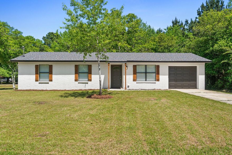 Looking for a home that is move-in ready and affordable?? This is the one for you! Situated 15 minutes from Bonifay, 45 minutes from the beach, and just minutes from churches, grocery stores, military bases and schools this house is in a great area. It has been fully renovated from head to toe. Features include a brand new kitchen with new cabinets, quartz  countertops, sink with new fixtures, and stainless steel appliances. The stove and microwave are new and come with factory warranties and the fridge and dishwasher are less than 6 months old. The bathrooms have new vanities with fixtures, new shut-off valves, and mirrors. The guest bath has a tiled surround with new tub and shower door. New flooring and toilet complete this bathroom. The master bathroom features a barn door and custom shelving for storage. The garage is freshly painted and has a new roll up door. The entire inside has been painted top to bottom and new tile flooring has been installed. All the windows have new blinds and all the rooms have ceiling fans and LED lighting. The home also has new HVAC with newly installed duct system. The roof has been replaced and both the HVAC and roof will come with a manufacturer's warranty. Even the exterior water spigots have been replaced! This owner has gone all out to ensure this home is comfortable and functional. Just bring your furniture and enjoy!!