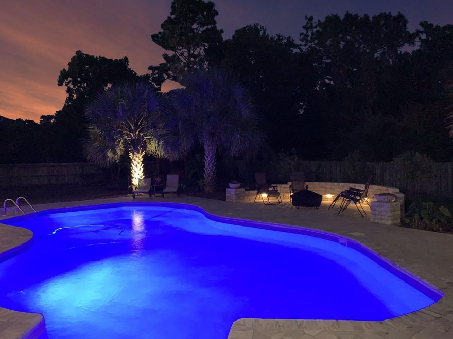 Welcome Home! This residence epitomizes luxury living at its finest! Nestled at the end of a cul-de-sac in Holly By The Sea is where you will find this well designed sprawling brick custom built home. This home welcomes you with an open floor plan and an abundance of natural light. The spacious living space and updated kitchen is ideal for gathering with family and friends.~4 bedrooms, 3 full bathrooms...plus a bonus/media room. ~236 sqft heated & cooled sunroom overlooking the pool.