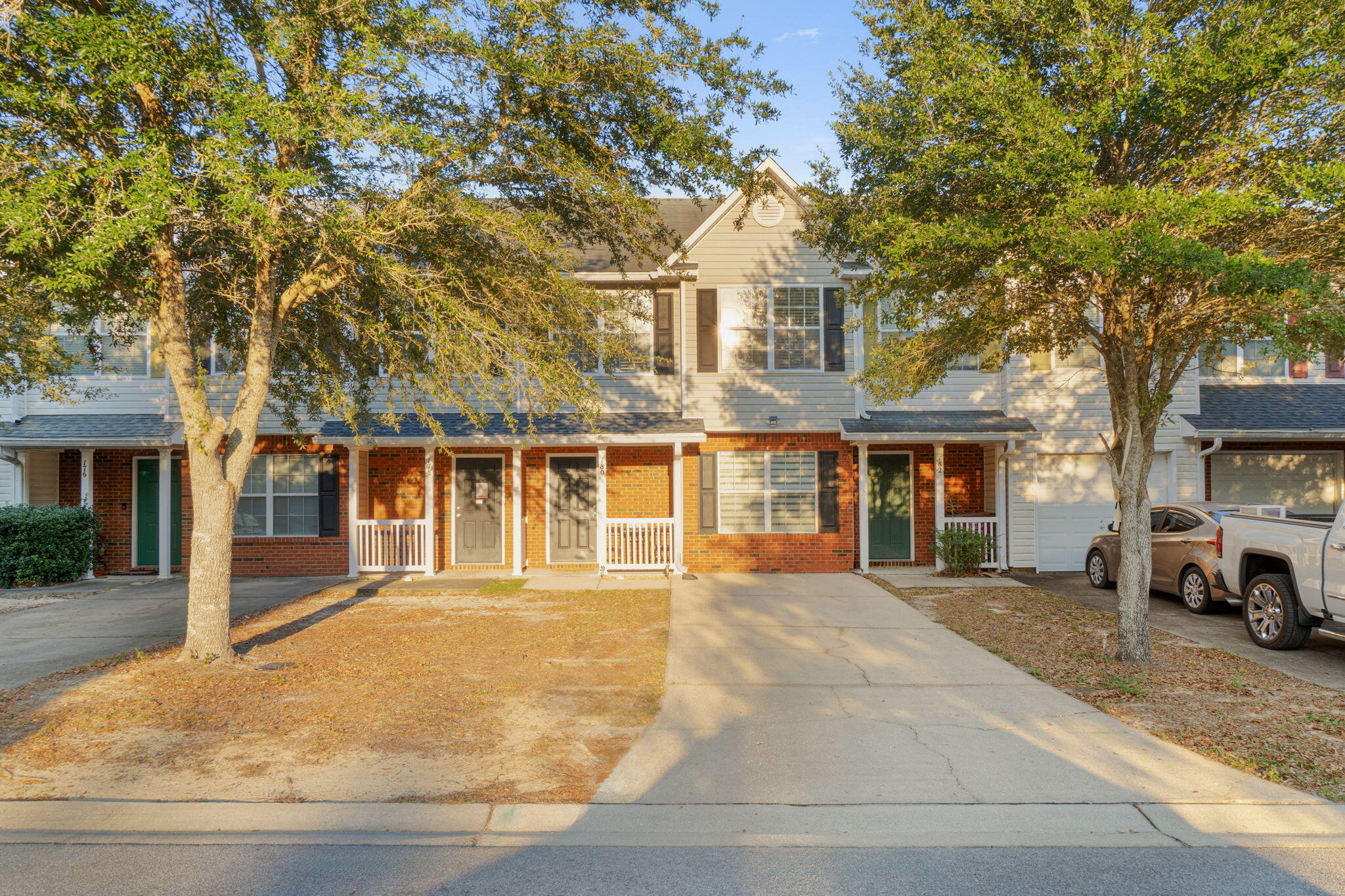 Welcome to 180 Swaying Pine Court, a charming and cozy 3 bedroom, 2.5 bathroom townhome in the desirable Rolling Pines subdivision. This inviting home spans over 1,500 square feet, offering a warm and welcoming atmosphere that's perfect for relaxing or entertaining. The layout maximizes comfort with spacious bedrooms, and a cozy living area, and extends to a fenced-in backyard, ideal for gatherings or quiet evenings. With a new water heater, and a new roof to be installed prior to closing, this home ensures both charm and reliability. Conveniently located near the hospital, Crestview Commons, and local schools, this townhome combines comfort, convenience, and community. Move in just in time to make lasting memories and celebrate the holidays in the warmth of your new home!