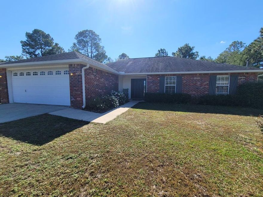 Brick, four bedroom, 2 bath, fenced home, on a culdesac, in South Crestview. Laminate flooring in common areas, carpet in all 4 bedrooms. Double car garage, large flat driveway and huge fenced back yard.