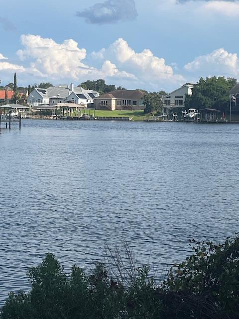 TO BE BUILT. Here is a perfect chance to have your custom dream home built, on one of the few waterfront lots in Shalimar by Greater Gulf Construction, LLC a Customer Home Builder. Price and square footage is an estimate only and subject to change as to Buyers construction plans and requirements.