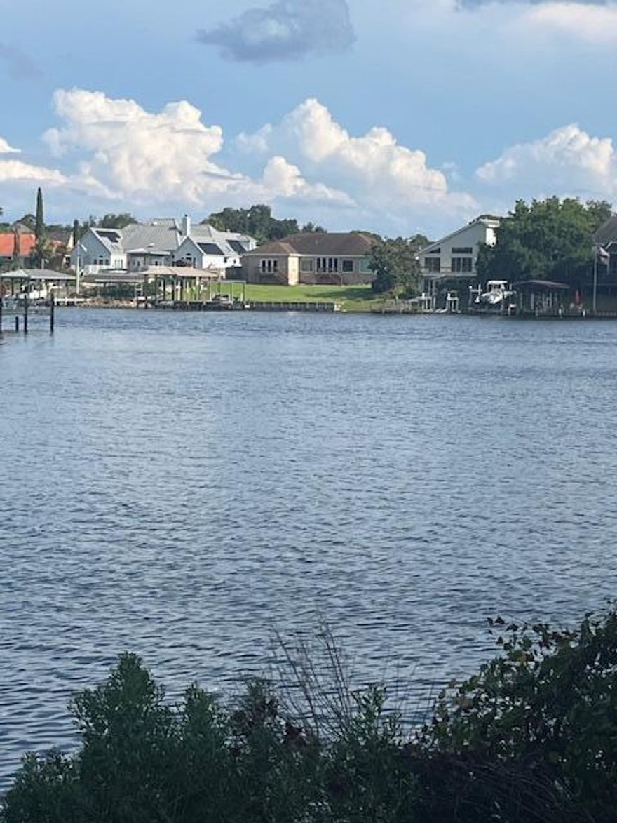 TO BE BUILT.  Here is a perfect chance to have your custom dream home built, on one of the few waterfront lots in Shalimar by Greater Gulf Construction, LLC a Customer Home Builder.  Price and square footage is an estimate only and subject to change as to Buyers construction plans and requirements.