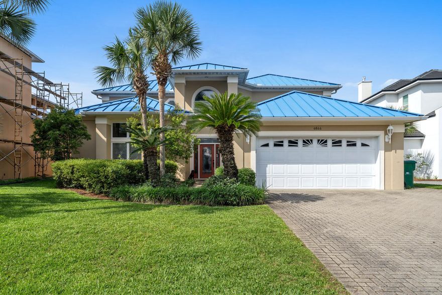 PRICE IMPROVEMENT!!! This lovely custom-built home in the gated community of Destiny is close to the crystalline green waters and sugar white sands of the Emerald Coast.  This home is conveniently located near the community amenities. These amenities include a pool, fitness center, tennis courts and community room. The house is situated on a large wooded lot that offers privacy as you relax on the enclosed patio. The home features a kitchen that is open to the family room which is great for entertaining. Each bedroom is an ensuite which is great for a primary or investment home. Custom metal hurricane shutters are stored in the garage. Destin has great shopping, dining and many other amenities for your enjoyment.  For the golfing enthusiasts, there are many beautiful public courses.