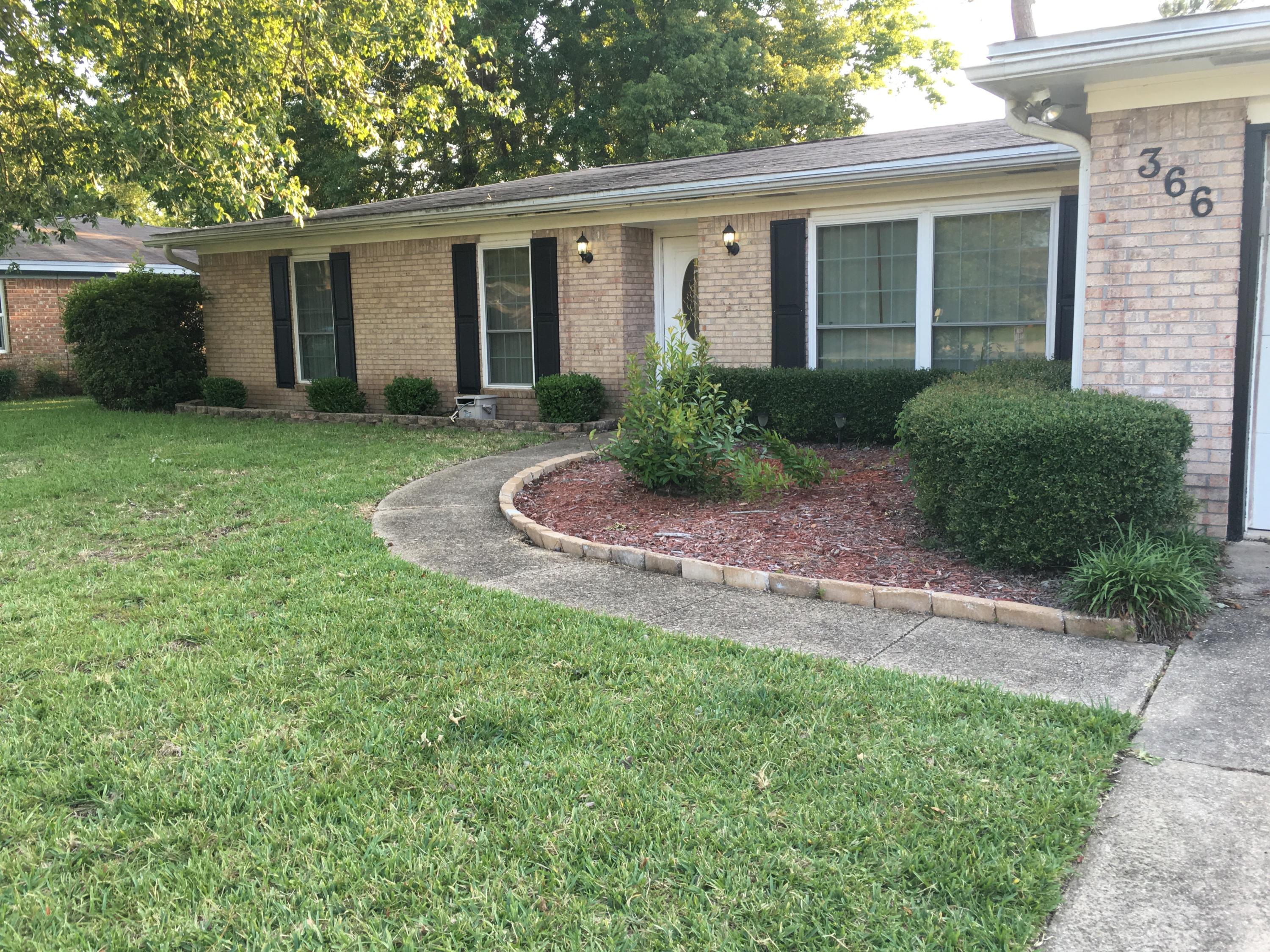 Excellent location in central Ft Walton Beach - close to schools and shopping - central to both Eglin AFB & Hurlburt AFB. Brick exterior w/ black shutters for great curb appeal. Lots of great natural light. Bright kitchen with white cabinetry and appliances, tiled floors in kitchen, den and baths. Den has a beautiful brick fireplace. Gorgeous hardwood floors in the living room and the hallway. Large fenced yard with a small storage/workshop in the corner.