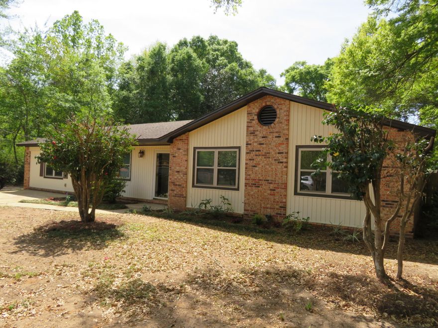 Awesome Location and TWO MASTER Suites! This 4 Bedroom / 3 full bath home is just 1 mile south of Hwy 90 in the Excellent Pace School District; it is on nearly -1/2 acre private, fenced lot. Fresh Paint and new carpet installed March 2019. This 2003 square foot home has upgraded appliances, including Bosch Noise reduction dishwasher and Frigidaire Stainless over-the-range microwave installed in 2016. The home offers a spacious Kitchen, separate dining room and large family room with designer tile flooring. Both Masters have walk-in closets and en-suites. There is wood laminate flooring in the hall and the 2 additional bedrooms. The large laundry/mud room provides a convenient second (private) entrance to the second master Suite area for split floor plan living: SEE MORE