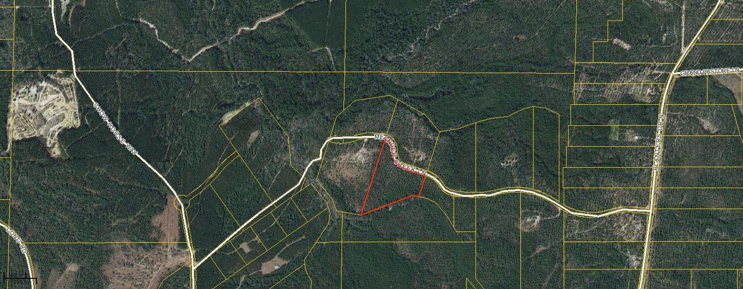 This large lot offers over 12 acres of wooded wonderland and as much privacy as you could dream of! On top of your own expansive property, owners have access to roughly 3000 acres of recreational room and trails for hunting, ATVs, and horseback riding. There is also a shooting range and ponds for fishing. If the outdoors are where your heart lies, this is the perfect place for you.