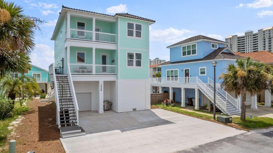 Presenting a stunning new construction in the prestigious Village at Navarre subdivision. This exceptional 6-bedroom, 6.5-bathroom residence offers views of both the Gulf of Mexico and Navarre Sound. Perfectly situated with beach access just steps away and neighborhood exclusive dock access to the Navarre Sound, this home epitomizes coastal luxury. This new home is the embodiment of a quintessential beach retreat.
