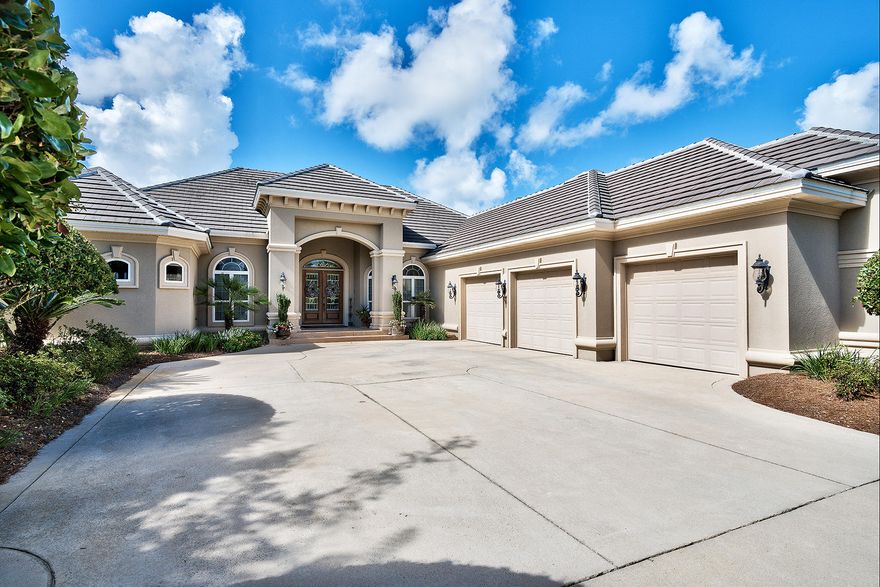 Set on a scarce lot measuring just over one full acre is the 3500 sq ft main house and detached ten car collector's garage with upstairs apartment comprising this Miramar Beach estate. Irresistible outdoor living areas that begin with a summer kitchen equipped screened lanai include a stately pool with expansive deck, as well as an extensive lawn bordered by colorful planting beds. Your tranquil paradise can be enjoyed from the comfort of a pavilion providing relief from the warm rays of a typical Florida day. Perfect for daily use, the attached three car garage cannot compete with the detached collector's garage set at the back of the property.