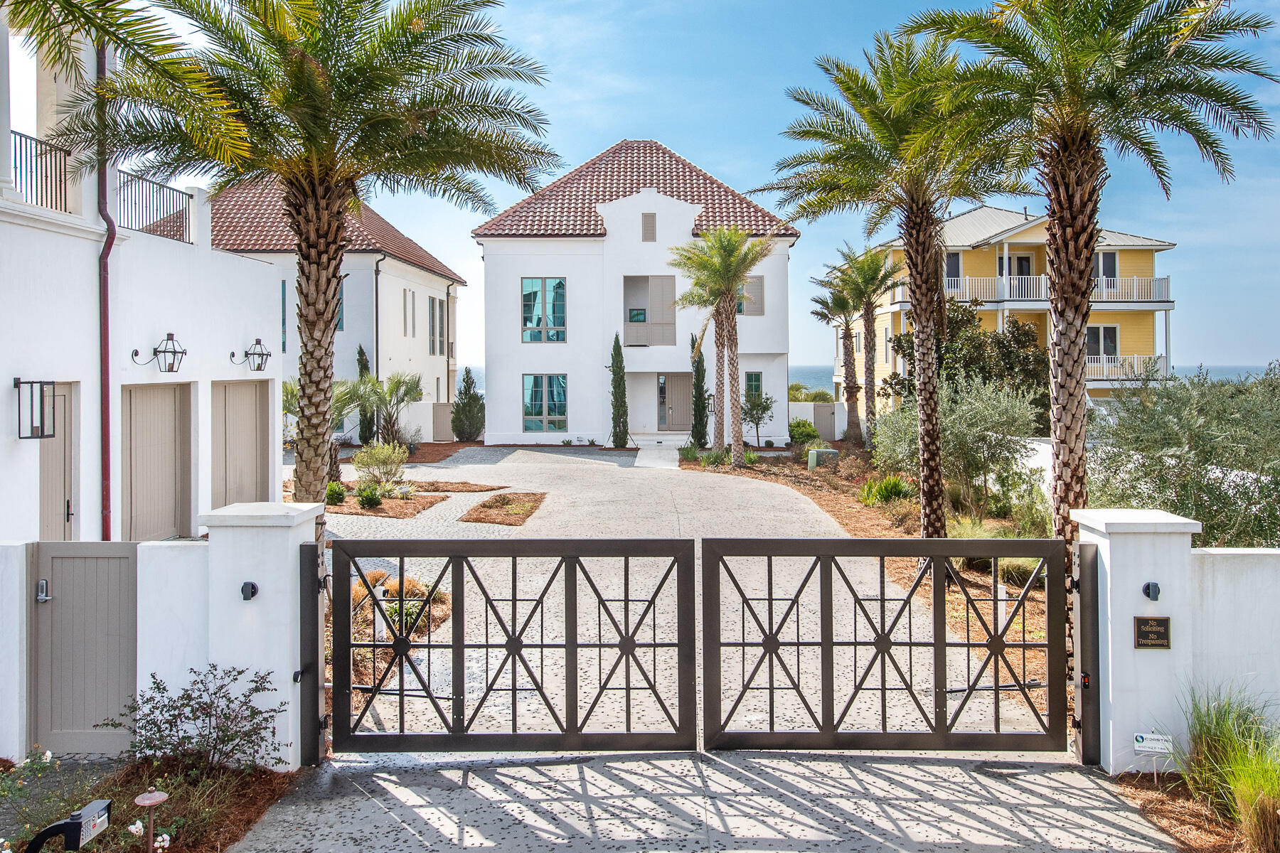 This luxurious Gulf-front home is located in the exclusive, gated Escape community at Inlet Beach, a private enclave of just four exceptional homes. Designed by A Boheme Design of Rosemary Beach and constructed to the highest standards by EarthBuild, the residence blends timeless elegance with modern comforts. Built with fortified construction and energy efficiency in mind, this home features the finest materials and finishes throughout.Spanning three levels, the home offers expansive Gulf views from every floor. The first floor includes three ensuite bedrooms, a large laundry room with an ice maker, and a morning kitchen perfect for preparing light breakfasts. A rotunda porch provides a peaceful setting to enjoy the views and begin the day, while a private beach walkover leads directly to the sand for easy access to the Gulf.

The second level is the heart of the home, featuring soaring 14-foot ceilings, a spacious living and dining area, and a gourmet kitchen. The chef's kitchen is equipped with top-of-the-line Sub-Zero and Wolf appliances, including a 42-inch Sub-Zero French door refrigerator, a 36-inch Wolf dual-fuel range, two ASKO dishwashers, and a Wolf under-counter microwave drawer. Polished marble graces the large island, offering a bar seating area for casual dining or cocktails. A generous walk-in pantry and an outdoor grilling area provide additional convenience. This level also includes a bedroom and a full bathroom, plus a second expansive porch to enjoy Gulf breezes and alfresco dining.

The third level is dedicated to the luxurious master suite, which boasts a vaulted ceiling, a freestanding oval tub, and a walk-in closet with ample storage. The suite opens to a private balcony with panoramic Gulf views, offering a perfect retreat. The master bath features tongue-and-groove details and a spacious layout, creating an inviting atmosphere to unwind and reflect. A second laundry room is also located on this floor, adding to the home's convenience.

Outside, the property is beautifully landscaped with Belgian cobblestone pavers leading to the garage. The neighborhood offers shared ownership of an L-shaped pool, with a rooftop sun deck and stunning Gulf views. An outdoor gathering space with a summer kitchen and an indoor meeting space with another kitchen provide perfect settings for socializing with neighbors or hosting intimate events.

With concrete barrel-vaulted tile roofs and three-coat stucco over concrete walls, this home is built to last. The Escape community is designed to provide the utmost in privacy and luxury for its residents, making this Gulf-front residence the ideal retreat for those seeking something truly special.