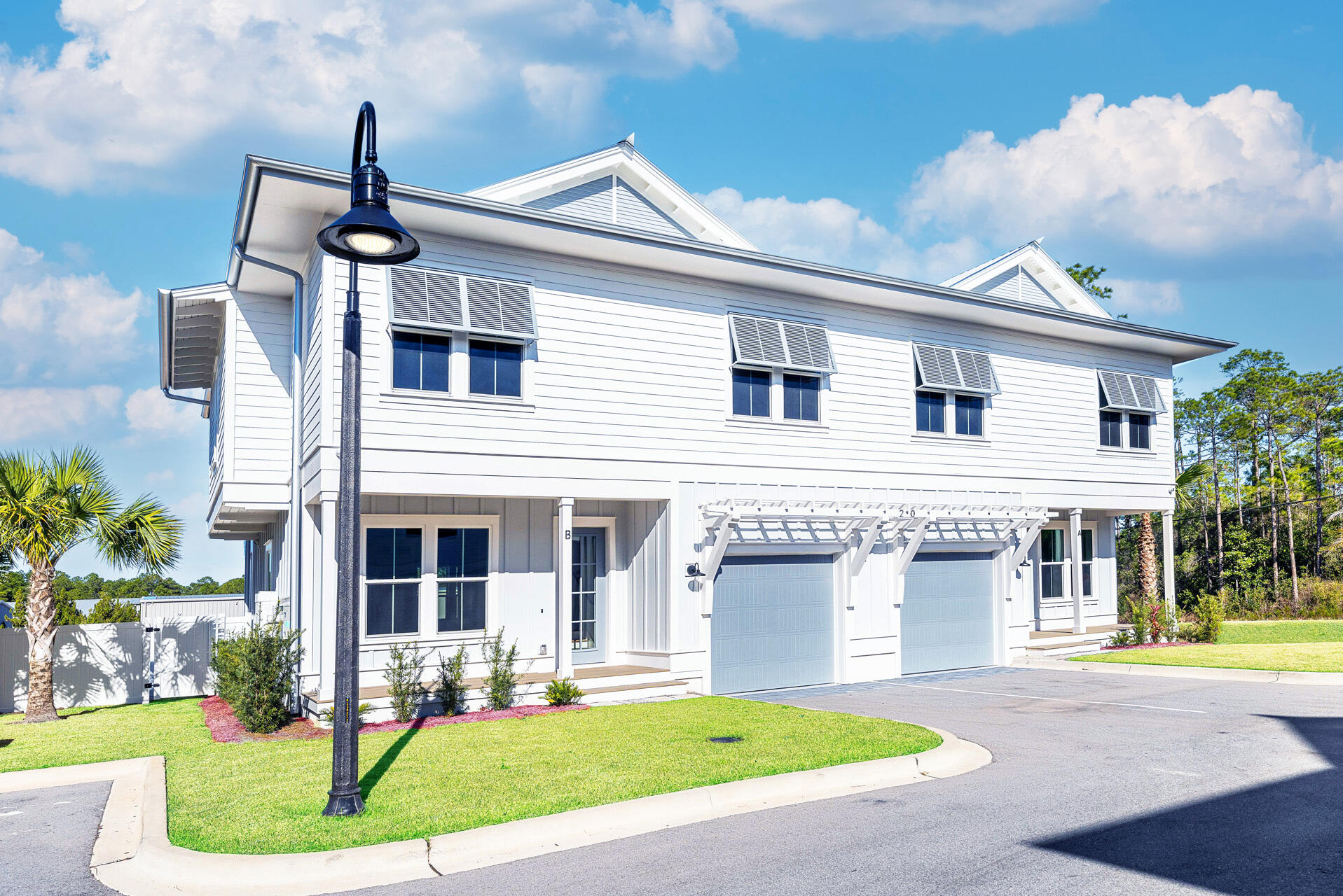 Discover Century 393, Santa Rosa Beach's newest townhome community, offering a blend of modern design and prime location. Situated at 520 S Co Hwy 393, this soon-to-be gated development places you just minutes from Ed Walline Beach Access, Gulf Place, Shunk Gulley, and Papa Surf Burger Bar--all easily reached by golf cart. Unit #20B spans 1,914 square feet of heated/cooled space and 2,412 square feet under roof, thoughtfully crafted for comfort and style. This three-bedroom, four-and-a-half-bath townhome includes a versatile bunk room, high-end finishes, and a fully fenced backyard. Outdoor living is a dream with a built-in kitchen and private hot tub, making this home ideal for both personal enjoyment and investment potential.
Inside, an open-concept main level flows effortlessly between the living, dining, and kitchen areas, enhanced by natural light. A walk-in pantry, powder bath, laundry room, and one-car garage complete the first floor.
Upstairs, the primary suite offers a dual vanity and walk-in shower, while both guest bedrooms feature private ensuite baths. The additional bunk room serves as a flexible space, whether for extra sleeping arrangements or a home office, with a hall bath featuring a double vanity and tub/shower combo. As one of only four units in the community with a private hot tub, Unit #20B stands out as a premier offering. A dedicated ice machine in the garage ensures effortless beach days. Short-term rentals are allowed, making this an excellent opportunity for investors. Future expansion on an adjacent 10 acres will introduce a resort-style pool, sun deck, and cabana, enhancing the neighborhood's appeal. Don't miss the chance to secure a luxury coastal retreat in one of 30A's most exciting new developments.