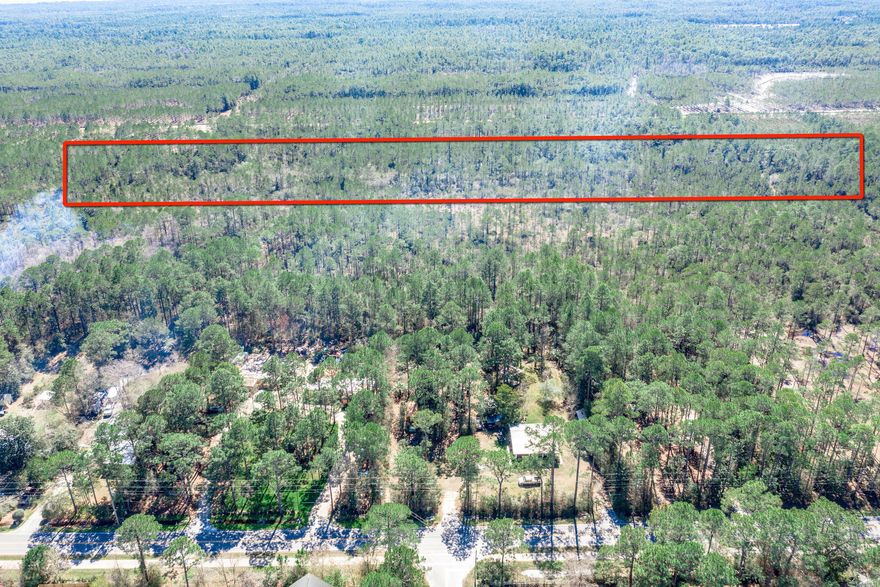 10 Acres in Santa Rosa Beach zoned Conservation Residential, 2 units per acre. Portion of the property is in X Flood zone. Would make for great location for landscaper, construction company or utility company that would need temporary location for supplies, materials, or machinery or make a private escape and build out for a family compound or ranchette. Walton county School District recently purchased neighboring parcels for recreational plans for school district.