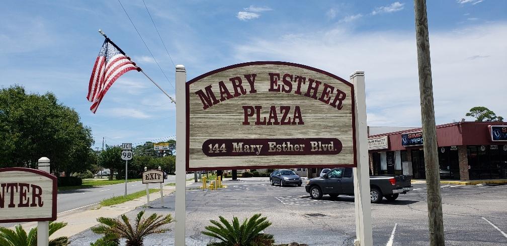When you enter Mary Esther Plaza these two units are directly in front of you. currently used by the seller for his trophy/framing/sign business that he is relocating to Georgia. This is an exceptionally well maintained condo complex.