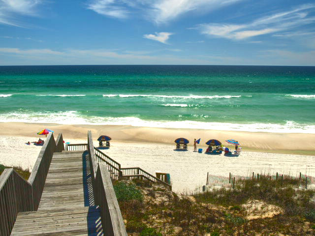 Gulf Side estates is a 15 lot one street (with cul de sac) subdivision that has private deeded beach access across the street to the east of Capistrano condos. This access is shared by Capistrano (on gulf) and Gulf Vista (TH's to the west). Lot one is located half way down the street of Pelican Glide on the left featuring possible gulf views, no HOA fees or build out time. There are currently 10 homes already built and 5 lots on Pelican Glide. Enjoy Rosemary, Seacrest, Alys, Watersound and Seagrove Beach via the 30A bike path across the street. Watersound Parkway is just 1/2 mile to the east allowing for quick proximity to 98, Destin and Panama City Beach. This is a great opportunity to build your dream beach home in this quiet, ''old Florida'' area of Seacrest.