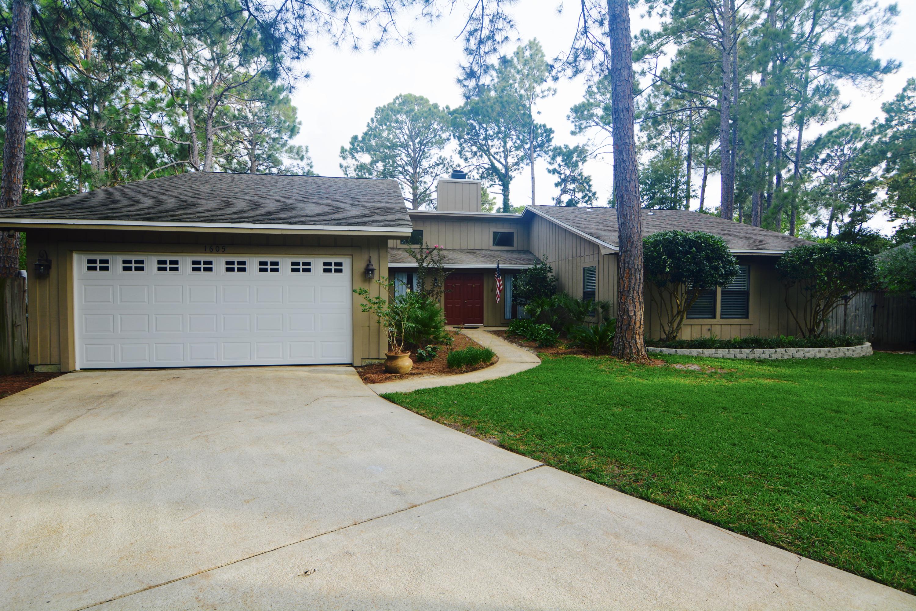 OPEN HOUSE TODAY 7/29 1-3PM The perfect family home that offers beautiful golf course views while being located on a small & quiet cul-de-sac in Bluewater Bay. This is a great floor plan with a large enough dining room to host the entire family...and then some! Dining flows right into the large living/family room that boast the same gorgeous new floors, natural stone wood burning fireplace, and lots of natural light. The kitchen offers new granite, stainless steel appliances, freshly painted cabinets, and the perfect bar for entertaining guests or feeding the kids. The owners have removed the popcorn ceilings and have freshly painted both inside and out. Large additional bedrooms share the hall bath showcasing the beautiful new granite countertop and plenty of storage. The