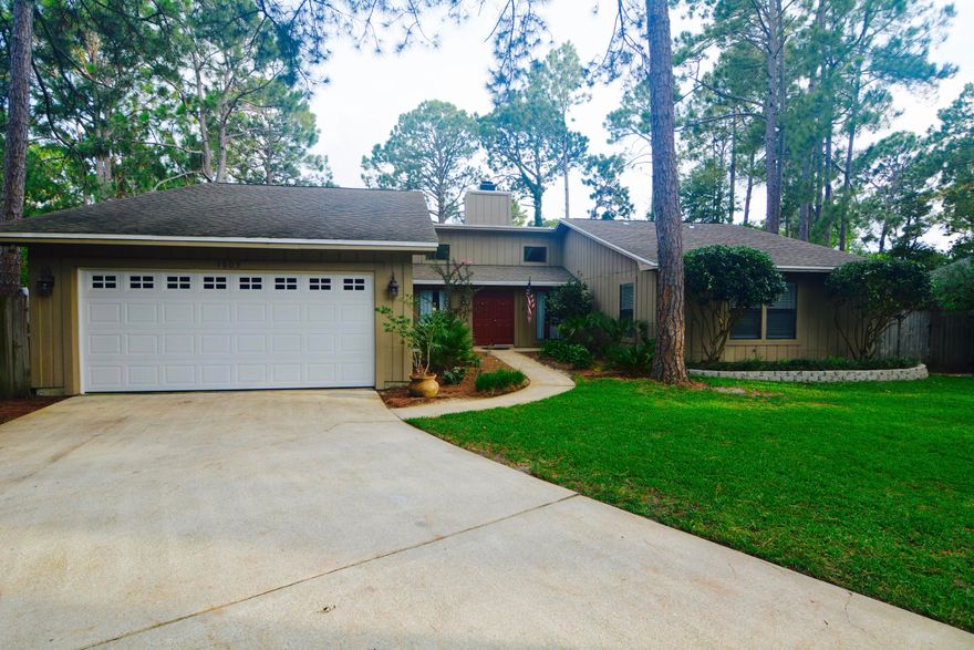 OPEN HOUSE TODAY 7/29 1-3PM The perfect family home that offers beautiful golf course views while being located on a small & quiet cul-de-sac in Bluewater Bay. This is a great floor plan with a large enough dining room to host the entire family...and then some! Dining flows right into the large living/family room that boast the same gorgeous new floors, natural stone wood burning fireplace, and lots of natural light. The kitchen offers new granite, stainless steel appliances, freshly painted cabinets, and the perfect bar for entertaining guests or feeding the kids. The owners have removed the popcorn ceilings and have freshly painted both inside and out. Large additional bedrooms share the hall bath showcasing the beautiful new granite countertop and plenty of storage. The