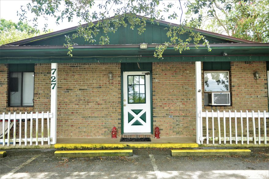 C-1 Commercial property and business for sale, located on the highly trafficked Valparaiso Parkway. The business is an established dog grooming and boarding  operating for over 40 years. The building is 2,941 sq ft and includes 39 - 6x20 indoor/outdoor dog kennels. The indoor cat area contains 38 individual kennels and a luxury ''Garfield's Paradise''. The grooming room has two fully equipped grooming stations, as well as an adjoining bathing and laundry room. There is a large kitchen with plenty of kitchen cabinets and counters, an examination room with cages for large birds. The property is located on a 0.79 acre lot (34,412.4 sq ft), with two road access points. Rear of property should be large enough for extra detached buildings. Convenient to Eglin AFB, Shalimar and Niceville.