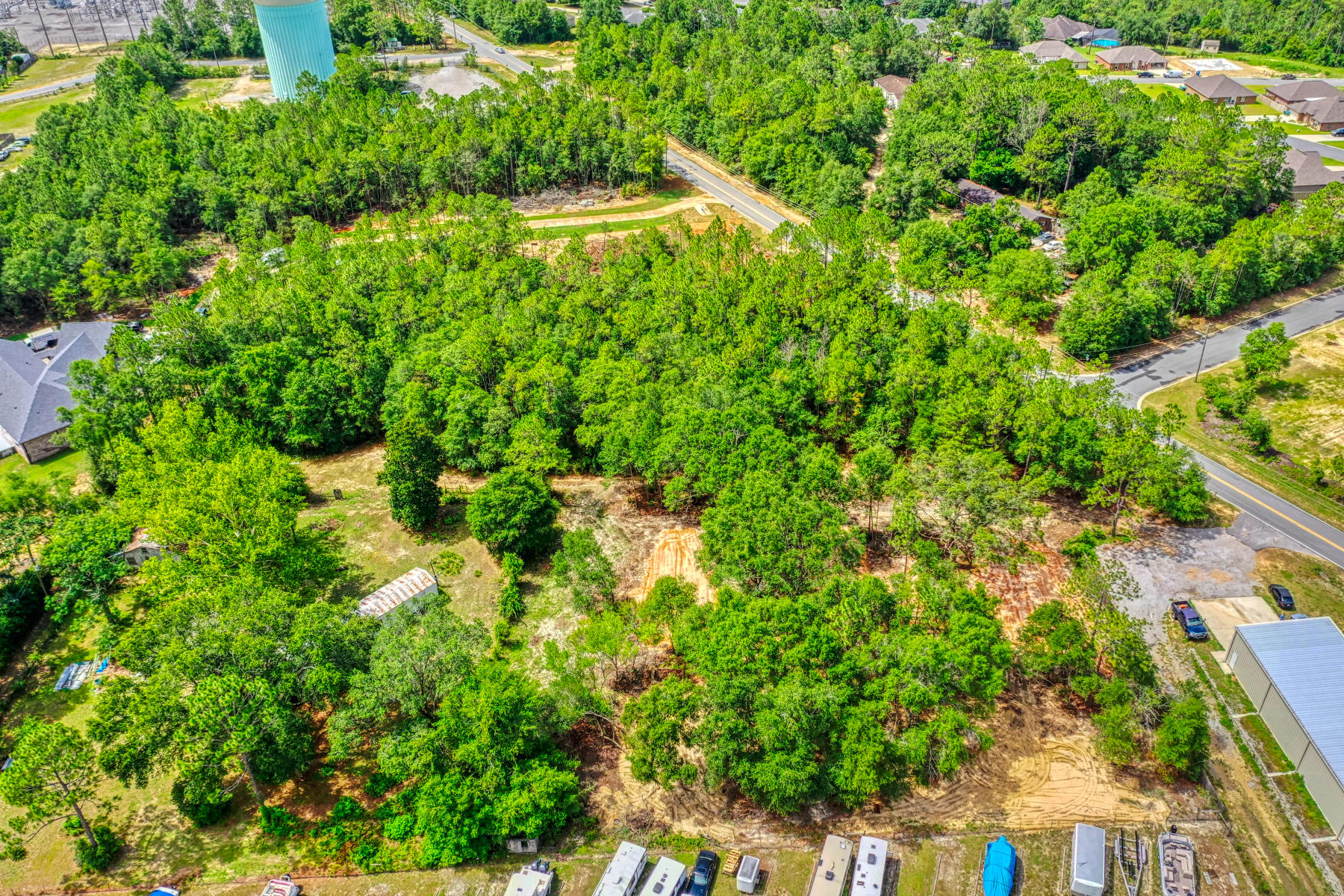 Looking for a getaway with great access to fresh water fishing? Bring the pets, bring the RV, bring the toys. Very close to Guest Lake Boat landing and Yellow River. This is the perfect affordable relaxing and fun location! Located on a paved road near the interstate for ease of access. Bring the camper, tiny home, or build a cottage in the country on 2 acres of fun!