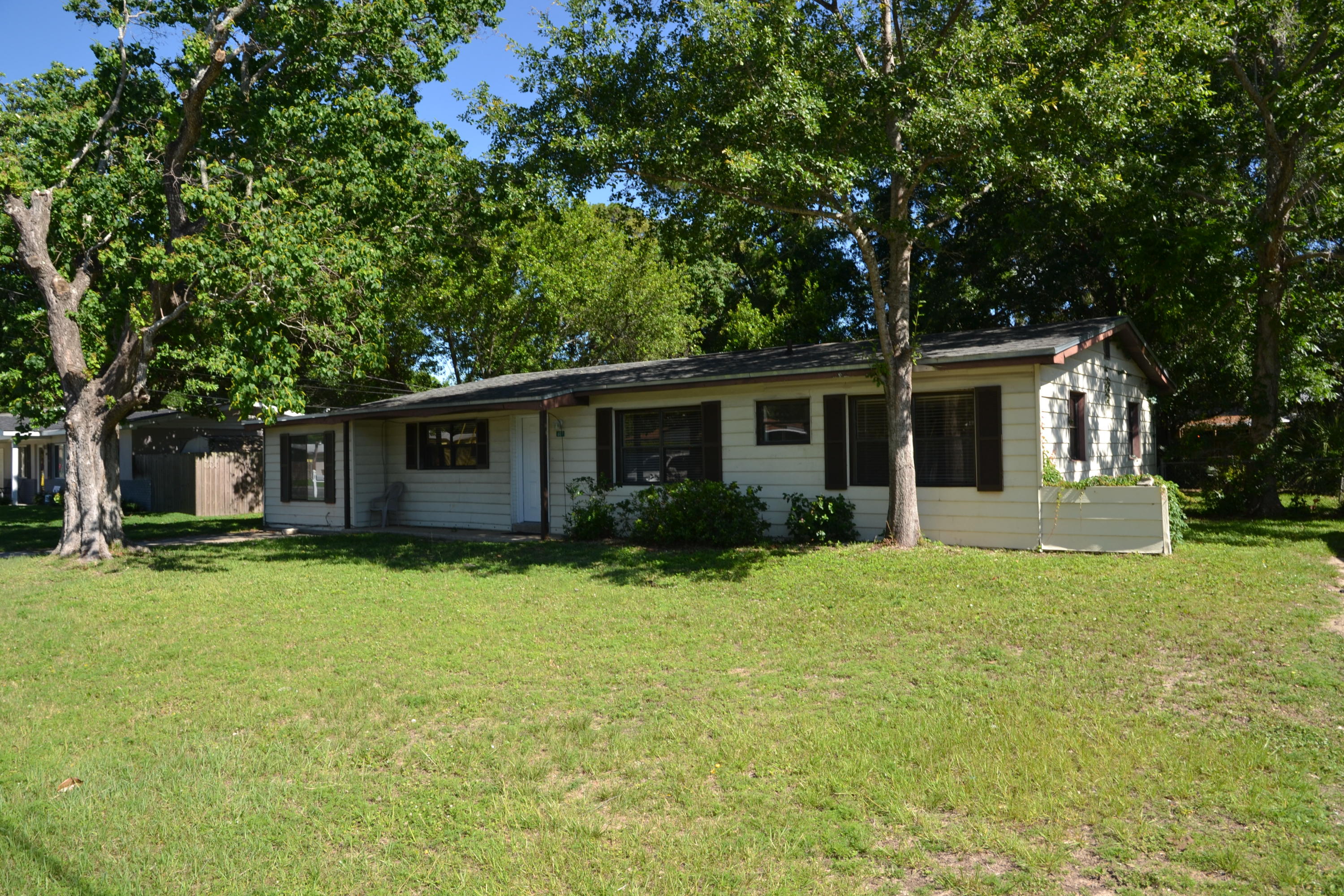 Great location and convenient to Schools, Restaurants, Shopping and less than 10 minutes to the BEACH! Split Floor plan home offers 3 Bedrooms, 2 Full Bathrooms, Living Room, Den, and a huge fenced in back yard! Storage shed and lean to are a great addition to the back yard. Plenty of space on the side of the home to park a utility trailer or recreational vehicle. Make this your Florida Cottage!