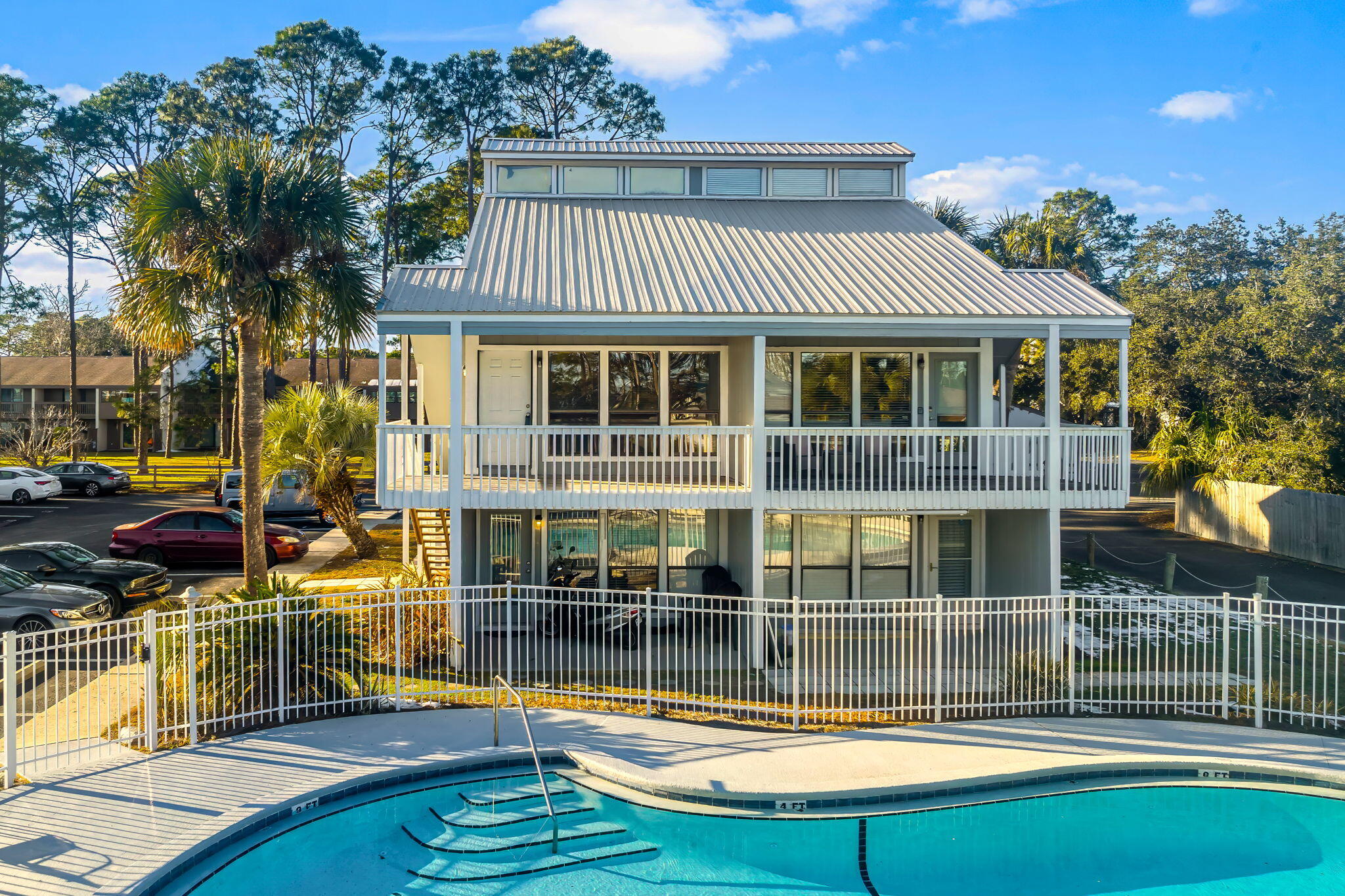 Investors, Boaters & First or Second Home Buyers! Welcome to Dockside North, a quaint 24-unit complex, that sits in a prime location on North Lagoon. Step inside this spacious two-bedroom, loft style condo, featuring an open floor plan. This one owner home is well preserved and just needs some TLC to bring it to life! Additional features include straight wooden stairs installed for the loft, Beautiful views of Grand Lagoon from your large private balcony. Take a stroll down to the community dock or enjoy a dip in the Pool. Explore the gorgeous waterways, beaches and shell island, as community boat slips are available to all owners, on a first come, first serve basis for 14 day increments. Centrally located to shopping, dining and the emerald beaches. Call today to schedule a private tour.