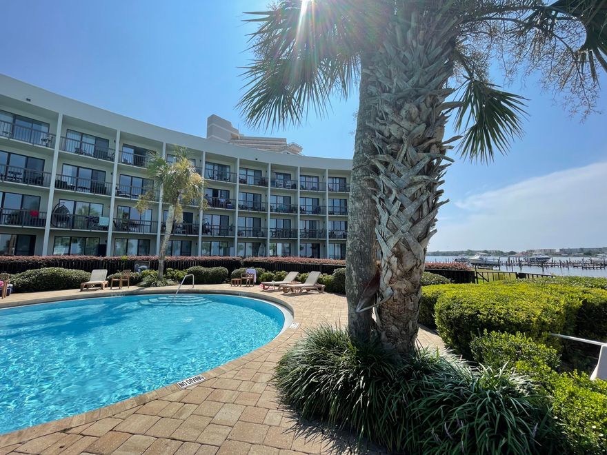 WOW!!  LOCATION!!!Check out this gorgeous furnished Studio Unit on the top floor here in Pirates Bay. Relax after a day on the water to that amazing sunset view over the pool and  Marina. Included in your deed will be a 44Ft boat slip #B4 so grab your fishing poles and enjoy a short boat ride down the inter-coastal waterway, Stop in for some Fun in the sun at Crab Island , and you can't forget about the Destin pass for fishing. The marina is under a one million dollar renovation currently ( assement already paid)!  Wow you don't want to miss out on this great opportunity!!