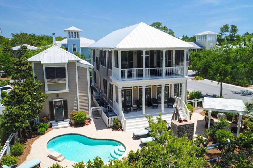 Minutes from the Gulf of Mexico, Town Center and Beach Club in Phase I of WaterColor, this Florida Cottage is located on an incredible homesite maximized to take advantage of the outdoor living space. There are no more homesites like this available in Phase I. Located on a corner lot just off 30A, this 5 bedroom, 5 bathroom home features approximately 1200 sft. of outdoor double porches, all hardwood pine floors, plantation shutters, with an open living/dining/kitchen floor plan. First floor contains a spacious guest bedroom with en suite bath. Master Bedroom is located on the second floor with access to the porch and views of Western Lake, 30A and all the activty in Town Center/Beach Club. There are 2 additional guest bedrooms w each having its own baths.
