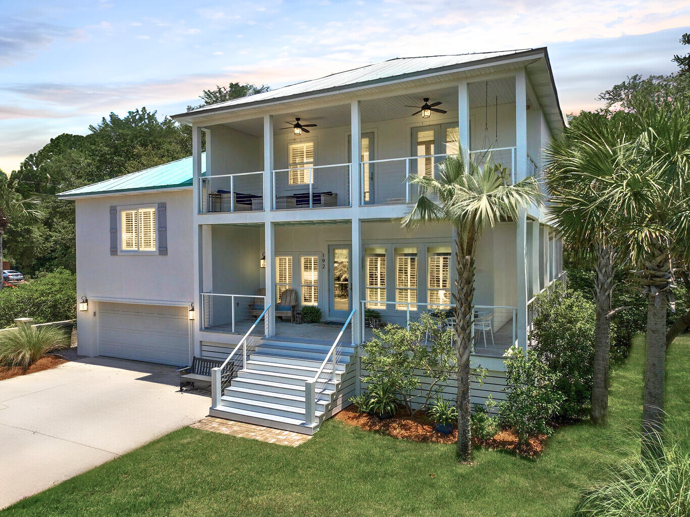 This is the one. Tucked behind the gates of a quiet cul-de-sac in Santa Rosa Beach, 192 Lake Pointe Drive offers a rare opportunity to own a fully renovated, designer-level home with direct access to 30A and Eastern Lake--one of Florida's rare coastal dune lakes.Renovated top to bottom in 2020, this 4-bedroom, 3-bath home blends high-end finishes with everyday luxury. The chef's kitchen features dual custom islands, quartz countertops, a gas range with pot filler, and upgraded stainless steel appliances--perfect for both entertaining and casual family life.Outside, step into your own private retreat: a tiered backyard with multiple porches, mature trees, and your own dock for paddleboarding or sunset drinks. This is truly a rare find! Throughout the thoughtfully redesigned interior, natural light floods the open living space, while the primary suite offers a spa-like bath with water views, and balcony. Upstairs also includes two additional bedrooms and a full bath. While a ground-level studio is ideal for guests, work-from-home, or kids.