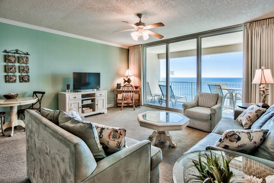 Incredible opportunity to own a fully furnished Gulf front condo on the desirable west end of Panama City Beach! With 4 floors of underground garage, this unit offers 17th floor elevation with amazing panoramic views of the Emerald Coast. This unit boasts an expansive open floor plan totaling 1,026 sq ft offering 1 bedroom, 2 bathrooms & a nice size bunk room. Crown molding is a beautiful detail for the main living areas & master. The kitchen features granite countertops & breakfast bar, and plenty of storage space with ample cabinets & a pantry. Tile floor extends throughout the common areas for easy maintenance. The floor to ceiling sliding glass doors & windows enhance the Gulf views even more. Access a spacious 170 sq ft balcony from the living area, the perfect place to relax & dine.