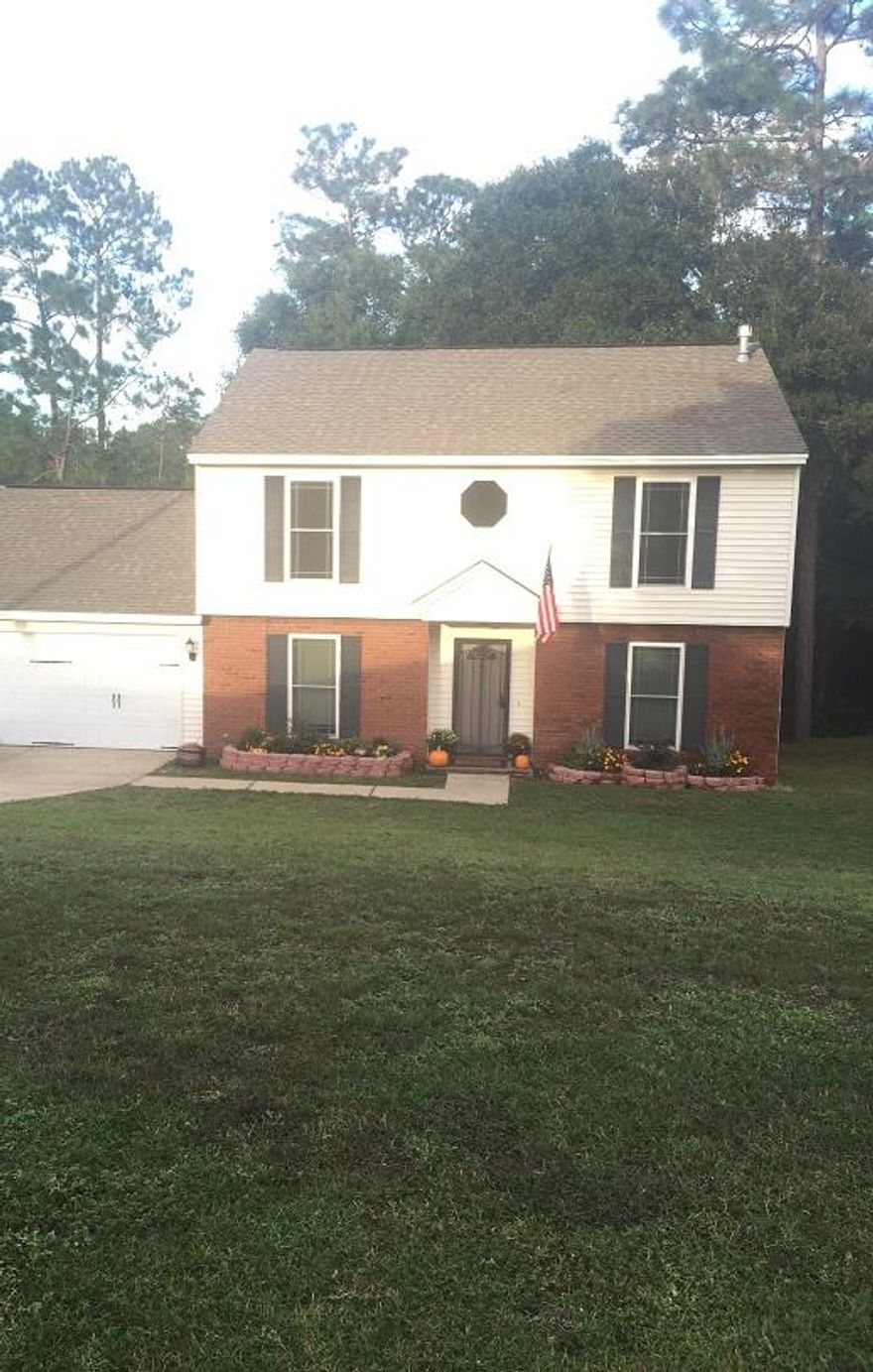 This one-owner home has been well maintained and recently upgraded. When you walk in the foyer you will notice the detail in the mosaic tile on the floor leading into the tiled kitchen and utility room. The kitchen has granite countertops and new cabinets. All appliances stay with the home and are all under 5 years old. You will love looking out to the wooded lot through the kitchen windows in your eat-in kitchen area. There are two entry points leading to the screened-in back porch, one just off the kitchen and the other in the well-lit front room. There are plenty of built-ins in the front room as well for extra storage and display area surrounding the fireplace. Finally the first floor includes a formal dining area that could be used as a fourth bedroom if needed.