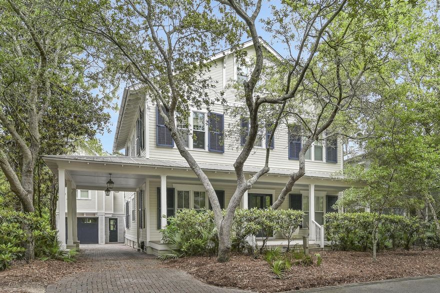 This luxurious home located in the premier location of WaterColor boasts stunning lake views and plenty of space to add a large pool and outdoor kitchen if desired. It is ideal for entertaining and has recently been updated with fresh paint, new furniture, and remodeled kitchen and bathrooms. The main home offers three bedroom suites, a home office/bunkroom, a TV den, a laundry room, and four full bathrooms on the first level. The second floor has an open living/kitchen/dining area, the master suite, and another full bathroom. The third floor is perfect for an extra bedroom, playroom, or media room. The 1.5-car garage is attached to a 1.5-story carriage house with a full kitchen. The two buildings are surrounded by lush landscaping and a patio, making this home a great rental opportunity.