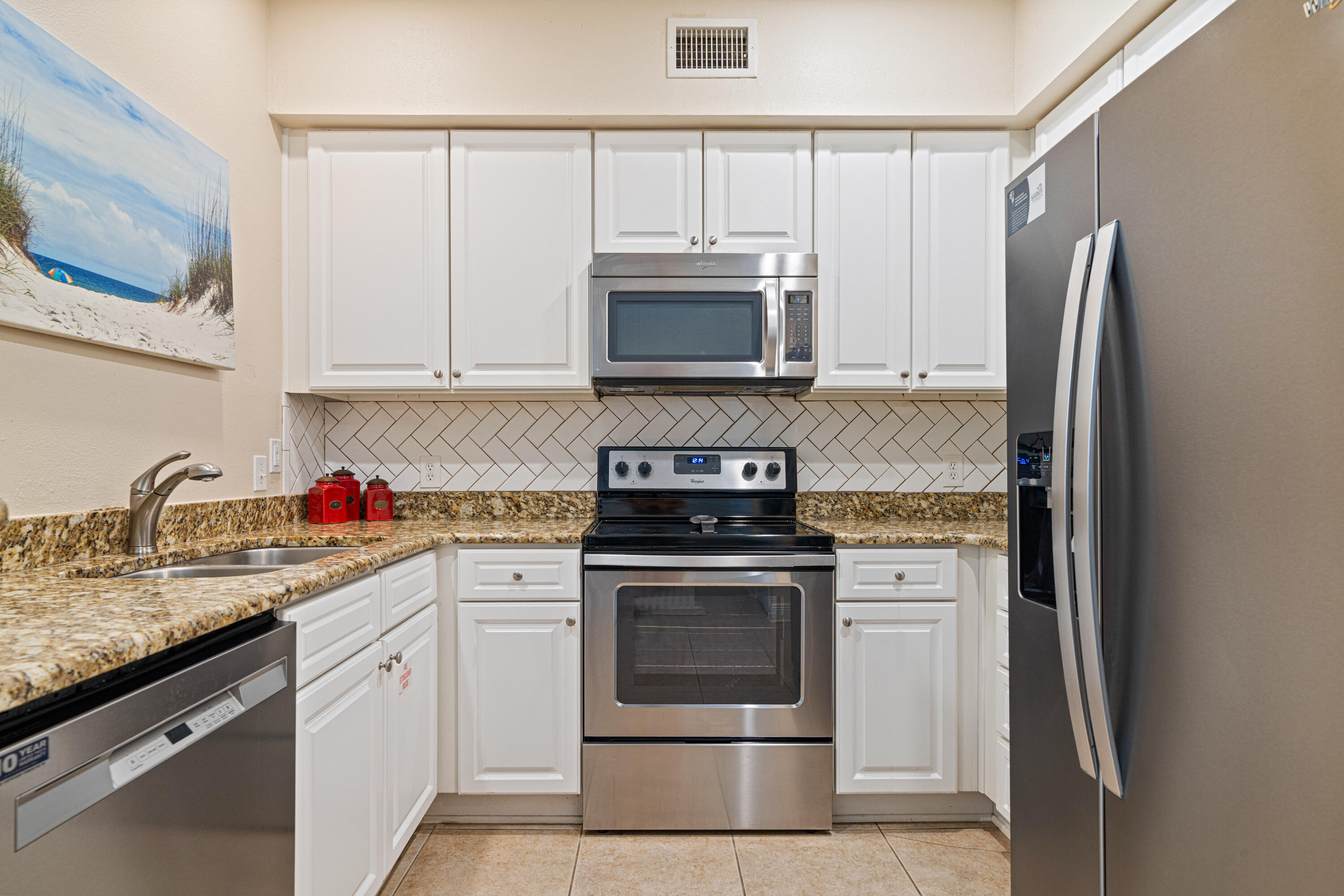 Fully furnished 3BR/2BA end-unit condo in the gated Village at Blue Mountain Beach on 30A. SUPER competitively priced...over $40K under the next lowest 3-bedroom currently on the market, this one is PRICED TO SELL. Prime location between Dune Allen and Grayton with public beach access just 1/2 mile away at Hwy 83 and Old Blue Mountain Rd. Inside you'll find updates such as stainless appliances, granite countertops and a custom backsplash. There are two bedrooms with king beds, and a third bedroom with bunks. Fridge and dishwasher were recently replaced, HVAC 2017, and water heater 2022, giving peace of mind on major systems.The Village features a large pool with cabana, fitness center, shuffleboard, grilling stations, bike racks, and well-kept green space. And the convenience is unbeatable...walk to Mimmo's Italian, an ice cream shop, coffee shop, nail salon, and a Thai restaurant. Don't miss this great opportunity and investment!
