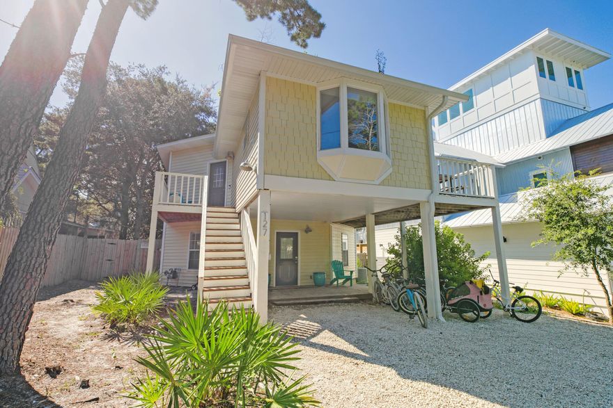 Highly desirable Old Seagrove listing in area seeing tons of new extremely high end construction. One street east of SEASIDE and all that Seaside has to offer.Main living on second level with three bedrooms and two baths with a bonus loft with two beds. The downstairs is a completely separate space with very nice one bedroom and bunk room area with a full kitchen .This property is ideal for an income producing investment.The back yard features a good size family pool.