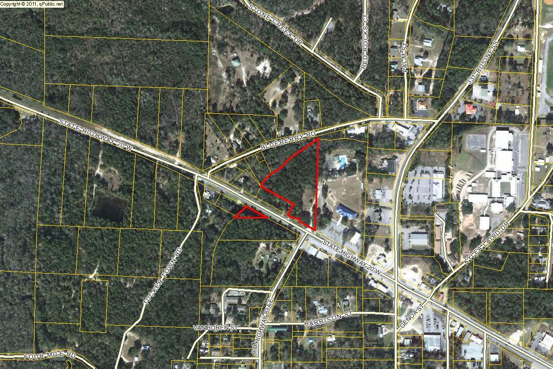 4.29 acres in two parcels in Freeport on west side of Freeport City Hall. 4.0 acre parcel on north side of State Hwy 20 and .2acre parcel on south side of State Road 20. Approximately 200' of road frontage on Hwy 20. Property zoned C-1 Commercial for offices, restaurants, light commercial, etc. 2.94 acres uplands and 1.35 acres wetlands.