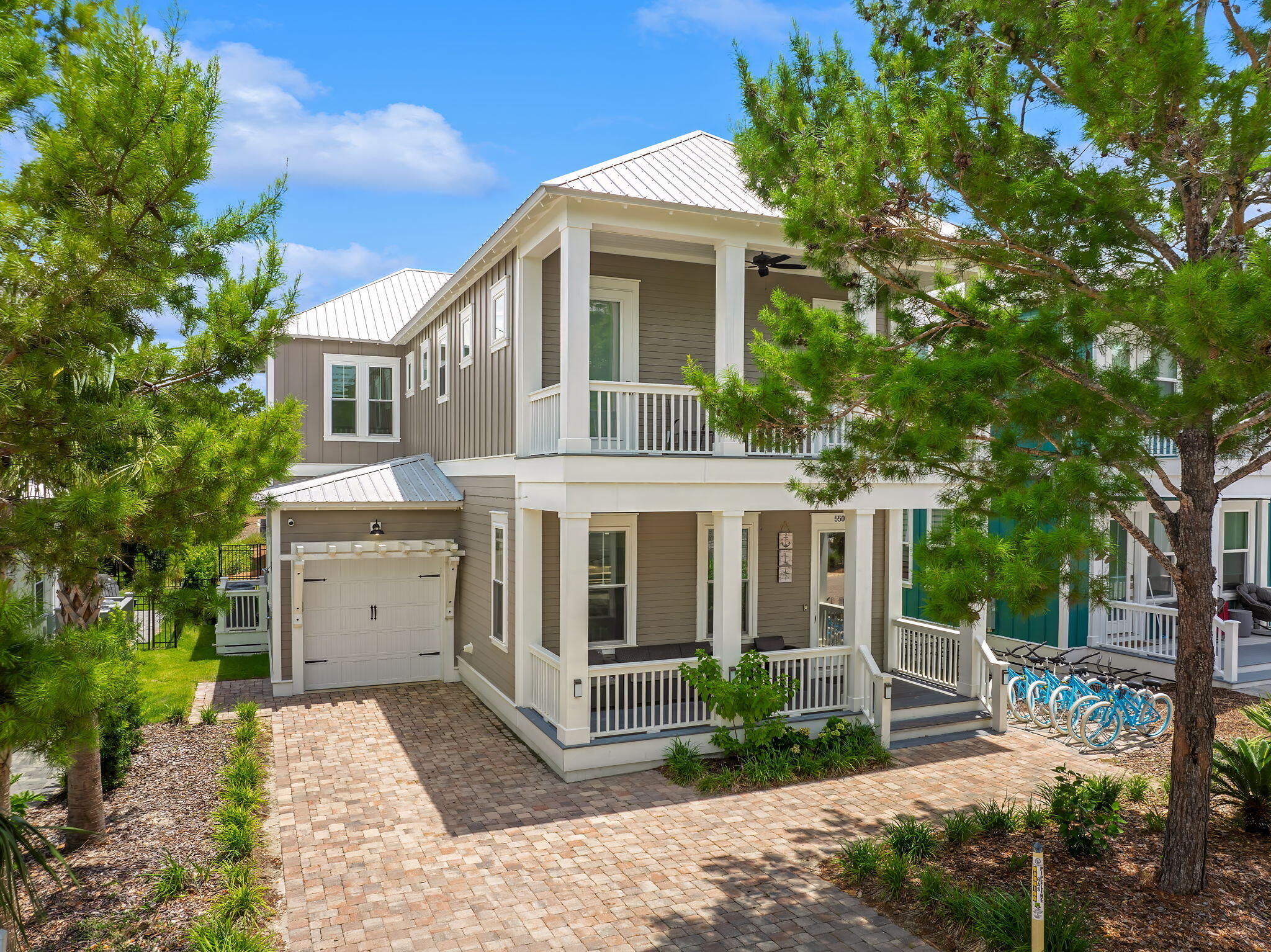 Welcome to 550 Gulfview Circle, a stunning 4-bedroom, 4.5-bathroom home in Highland Parks. Boasting 2844 square feet of modern open interior space, this fully furnished and turnkey cottage is perfect for vacation rental, full-time living, or investment purposes.Step inside to discover high-end finishes, hardwood floors, and raised ceilings with crown moldings. The main level features an open kitchen, private outdoor space, and a garage. The back yard offers serene pond view, making it an ideal retreat for relaxation.The home's three expansive porches provide the perfect setting for enjoying the beautiful surroundings. With two primary bedrooms - one on the first floor and one on the second floor - and all bedrooms featuring private ensuites, this property offers comfort and privacy for all occupants.
The second floor also features a large open space, perfect for additional gatherings. Located in the front of the neighborhood offering quick access to Scenic 30A is a breeze.
The traditional charm of the home is enhanced by ship lap accents and beautiful blinds throughout. The community of Highland Parks is located directly on Scenic Hwy 30A. Offering a beautiful resort style pool, hot tub, firepit, huge outdoor kitchen, and a 4-story tower to enjoy evening sunsets over the Gulf of Mexico.
Don't miss the opportunity to own this exceptional property with a prime location and an array of desirable amenities. Schedule a showing today and experience the coastal lifestyle at its finest!