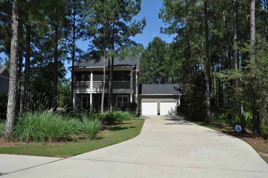 One-of-A-Kind custom home. 225 Whitman Way exhibits quality at its finest. Featuring front and rear columned and covered porches, old-world re-claimed brick, large pane windows, and attached 2-car garage with individual doorways. Set back off of Whitman Way in the Passages neighborhood of Hammock Bay, this Southern charmer is loaded with fine finishes, very few homes offer in Hammock Bay. You will enjoy all the wonderful interior features and abundant upgrades, including: a master on the main floor; 10 ft. ceilings; hardwood floors; recessed lighting; pendant lighting; 8 ft. interior doors; chiseled-edge Travertine floors; hardwood cabinets; custom shower in master bath; crown molding in all living areas; 2X6 exterior walls; Gourmet kitchen;