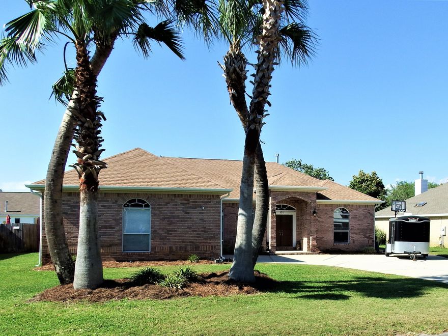 Welcome home to your private oasis! Imagine coming home every day to palm trees, taking a refreshing dip in your salt water pool, & relaxing in the shade on your covered patio. Let's not forget enjoying the sunsets on your private community beach.
The master suite features an 8x14 sitting area, with access to the pool/hot tub. The master bath features a large walk-in closet, double vanity, separate shower, & tub.
The kitchen has granite countertops & stainless steel Whirlpool appliances (everything conveys), island with electricity, under cabinet lighting, breakfast bar, & pantry.
When it starts to cool down, relax in the family room & enjoy your gas fireplace surrounded by built in glass shelves, & enjoy your view through your large double sliding glass doors.
Many neighborhood events are scheduled throughout the year via the VOLUNTARY HOA.   Call today to schedule your own private viewing and to see everything else this home has to offer!