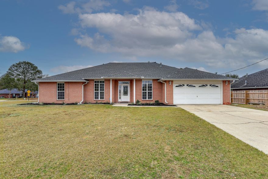 Beautifully renovated home just north of i10. This 2361 sq ft corner lot home includes NEW ROOf and many extras. New White shaker kitchen cabinets with luxury quartz countertops backed up with an elegant subway tile. Wood look tile throughout home and LVP in all bedrooms. Master bath includes walk in closet, double sink vanity and HIS and HERS WALK IN SHOWER!! Home includes screened porch, painted garage floor, LED lighting and new fans and fixtures. Great size backyard perfect for enjoyment or a new pool!!