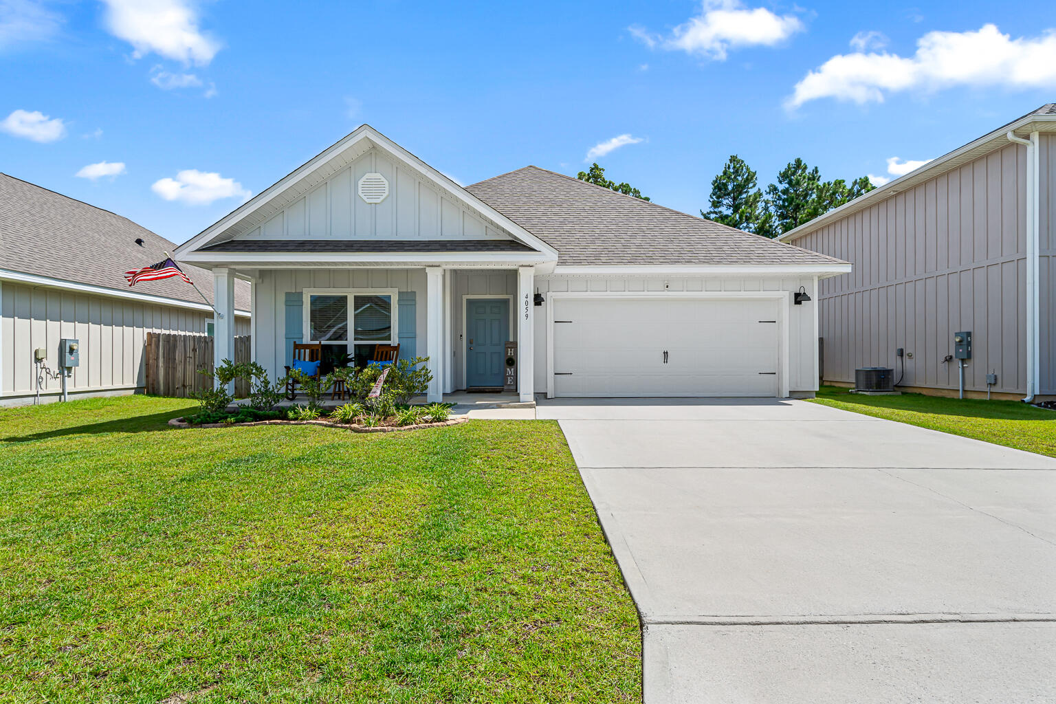 VA ASSUMABLE LOAN AT A SUPER LOW INTEREST RATE AND LOW MONTHLY PAYMENT FOR VA QUALIFIED BUYER!!! Welcome to this charming four-bedroom, two-bathroom home that perfectly blends comfort with style. The open floorplan creates a natural flow throughout the living spaces, making it ideal for both daily life and entertaining guests. Luxury vinyl plank flooring flows seamlessly through the common areas, offering both durability and elegance. The heart of the home features a well-appointed kitchen with stainless steel appliances, granite countertops, and crisp white shaker cabinets that offer ample storage. A convenient pantry ensures you'll never run out of space for essentials. High ceilings and decorative tray ceilings add architectural interest and create an airy atmosphere throughout. The primary bedroom suite serves as your personal retreat, complete with an impressive bathroom featuring a separate stand-up shower, relaxing garden tub, and double vanity for busy mornings. A spacious closet offers plenty of room for your wardrobe. Access the fenced-in yard, perfect for pets or gardening enthusiasts. Both covered front and back porches offer wonderful spaces for coffee or evening relaxation. The home's durable hardie board construction ensures lasting quality and low maintenance. Located in a welcoming neighborhood with community pool access, you'll enjoy recreational amenities right at your doorstep. The area offers convenient access to Benny Russell Park for outdoor activities, plus shopping options including Publix and Target for daily necessities. This thoughtfully designed home combines practical features with comfortable living in a desirable location. DON'T FORGET TO CHECK OUT THE VIDEO!!