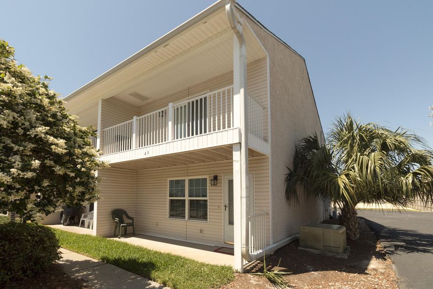 Bright Open & Airy 2BR/2.5BA 1,300SFTownhome Located Next to One of 2 Poolsin Woodland Shores. A Short Distance to the Beach This Townhome was Recently Updated and Features Tile & Bamboo Hardwood Floors, Granite Countertops, and Stainless Appliances. Fully Furnished.