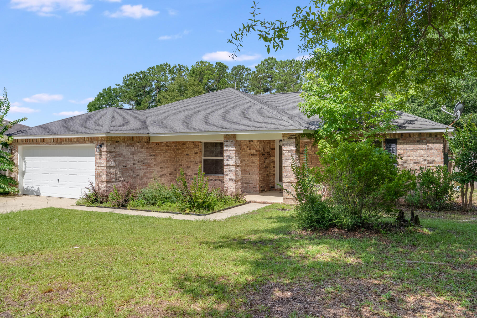 Tucked in the peaceful Pleasant Ridge subdivision, this 1,832 sq ft brick home offers a gated community feel with one way in and out--quiet, safe, and serene. The seller has thoughtfully updated the home prior to listing with all new appliances, new flooring, and fresh paint throughout. Move-in ready and shining with pride of ownership, this home features a 2-car attached garage and a spacious layout that's hard to match in this price range. Just minutes from major shopping and historic downtown DeFuniak Springs. Easy to show--call now before it's gone!