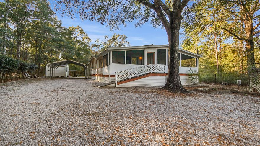 Waterview home in excellent condition and in a quiet neighborhood on a dead end road. Located across from Juniper Lake on 1/3 acre, sitting back from the road for privacy, this well maintained home offers a fantastic layout. The kitchen with island opens up to the living room with fireplace. The most convenient feature may be that the utility room is open to both the kitchen, as well as the master suite, making laundry day that much easier. Outside you'll find a detached garage/workshop, screened porch and the entire property is fenced. The roof is appx 10 years old and HVAC is 4 years old. Location can't be beat, so check out this home today.