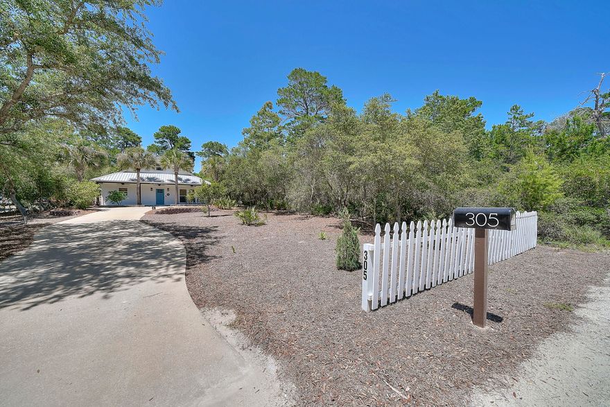Property has contract in place w/ 72 hour kick-out clause. Land, location and all the modern upgrades combine to make this a ''move-in ready'' beach home. This peaceful 2br/2ba Florida cottage in Inlet Beach sits on a 1/4 acre of land and surrounded by natural palmettos and trees. It's a brief walk the restaurants and shops of 30Avenue, and is a short bike ride to the beach or Lake Powell. This open-concept home was remodeled in the last year and you won't be disappointed by the finer touches you would come to expect in today's construction. Interior features include recessed lighting, LVT Waterproof flooring throughout, quartz countertops in the kitchen and bathrooms, stainless appliances in the kitchen, a new electric HVAC system, a tankless water heater, 9' ceilings with crown molding