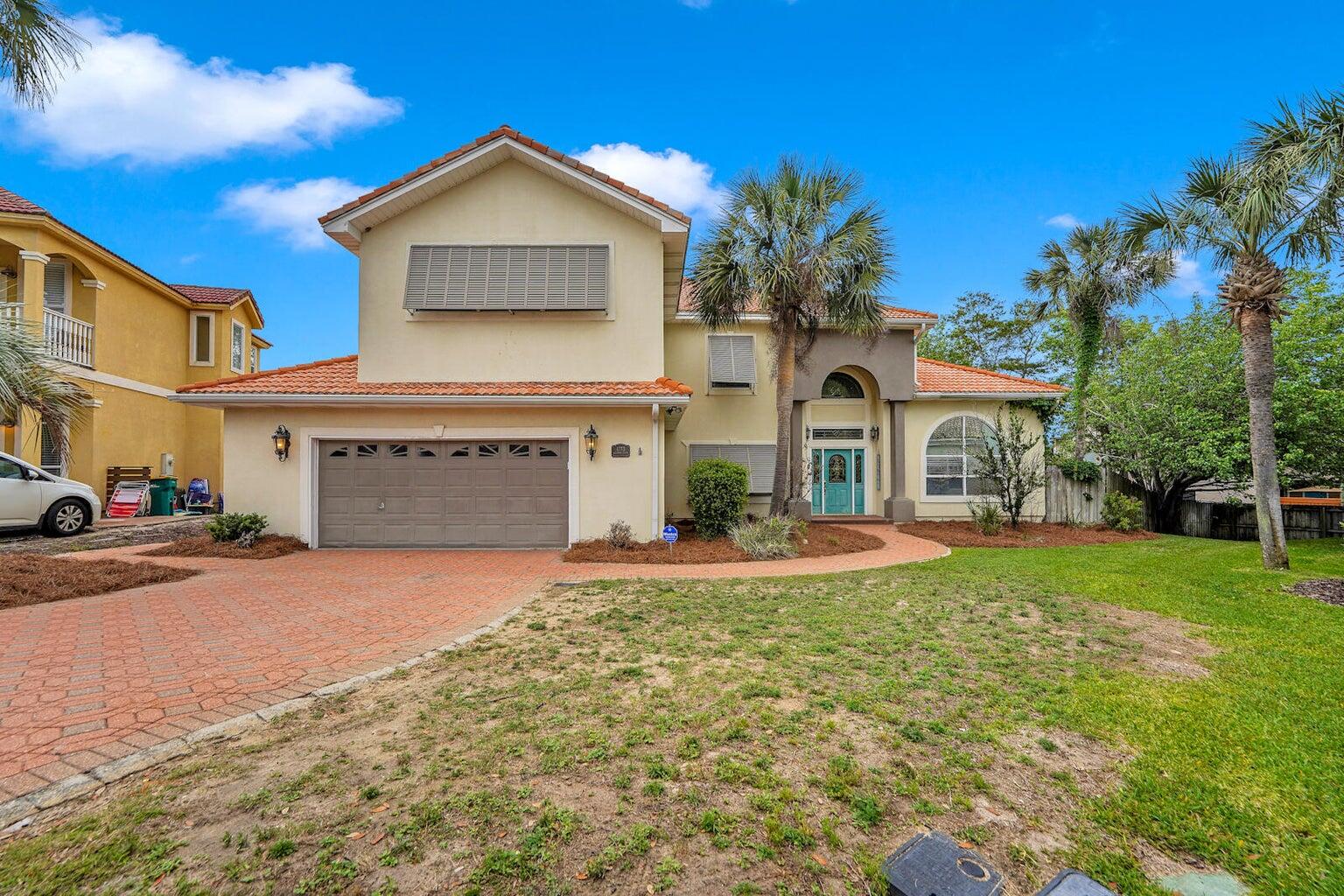 Welcome to Serenity by the Sea, Terra Cotta Terrace. Deeded beach access! Community pool, tennis/volleyball courts. This 4 bed (possible 5th), 3 bath home, located on a cul-de-sac, large double lot- room for a pool and over 3500 sq ft of living space. Seller has updated flooring, furnishings (included), new stove, over $20K in tree removal, new HVAC 7/23 at $7,000. Currently on a rental program w existing bookings already in place. Large kitchen/dining space that has a large island with an additional sink to include a 2nd garbage disposal, granite countertops, plenty of storage. Large open living room with fireplace. Spacious bedrooms throughout. Schedule a showing so we can make this your new home or investment! Buyer to verify all information and measurements.